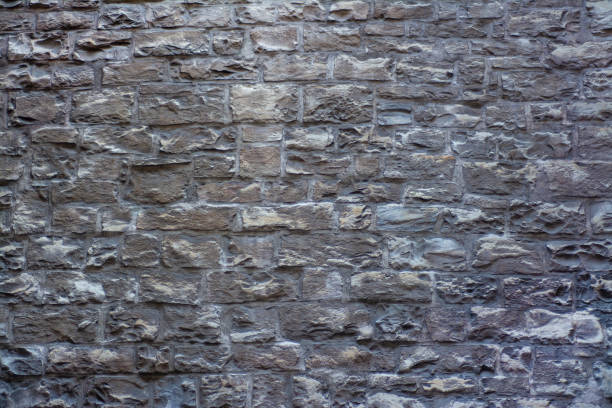istock The old wall of stone blocks 1187093695