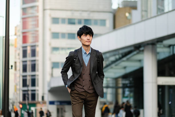 istock Young businessman on the way to home after work 1187099809