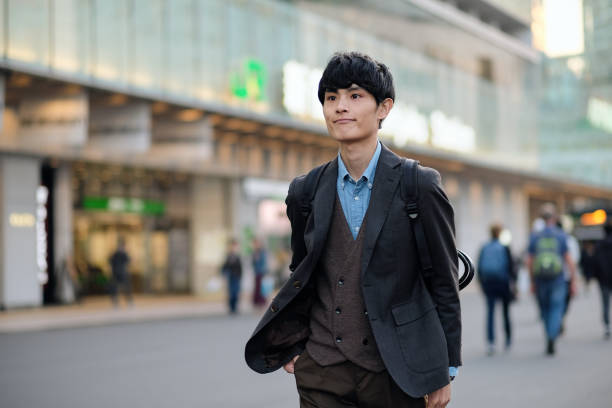istock Young businessman on the way to home after work 1187099810