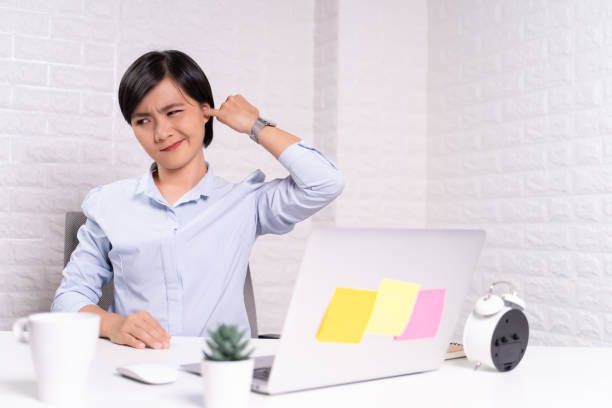 istock Woman putting a finger into her ear 1187100033