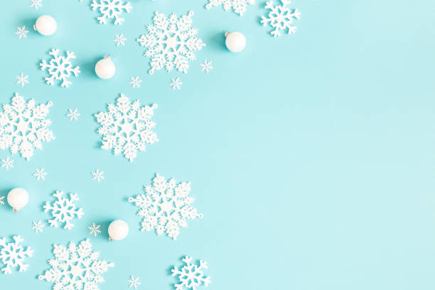 istock Christmas or winter composition. Pattern made of snowflakes on pastel blue background. Christmas, winter, new year concept. Flat lay, top view, copy space 1187100460