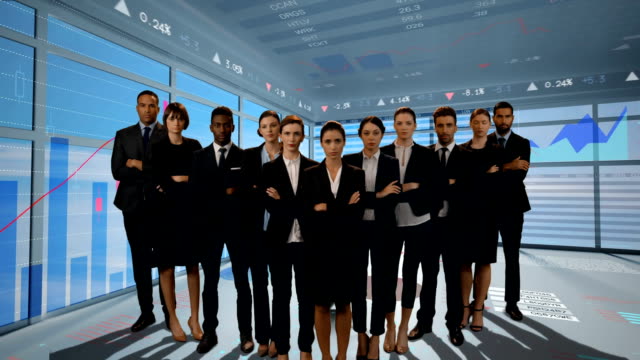 Business people standing in a room with graphs