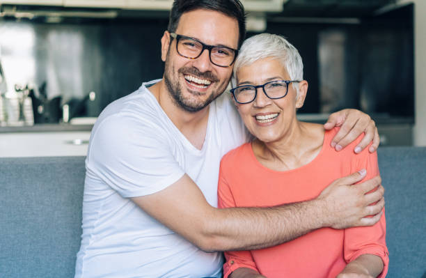 istock Happy senior woman and her son 1187101807