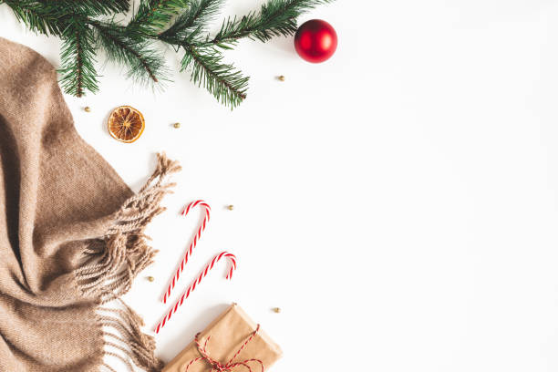 istock Christmas composition. Fir tree branches, red balls, plaid, gift box on white background. Christmas, winter, new year concept. Flat lay, top view, copy space 1187103080