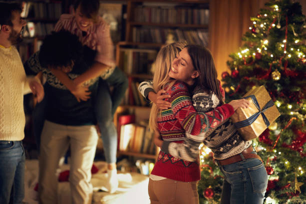 istock female friends celebrating Christmas 1187107236