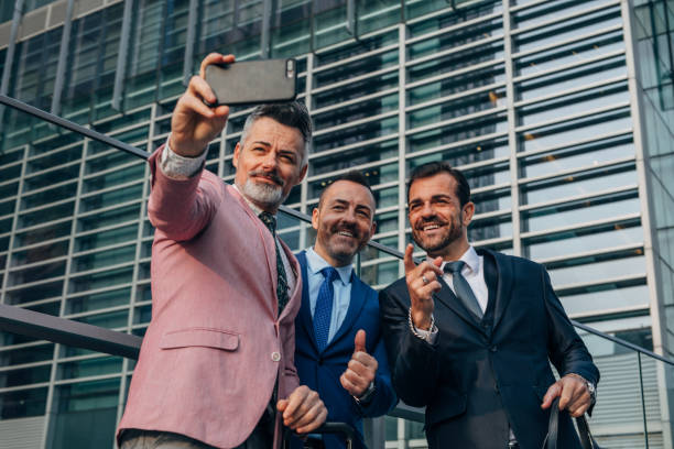 istock Charming businessmen taking a selfie 1187108461