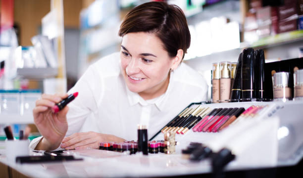 istock Customer browsing rows of cosmetic products 1187111461