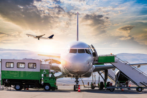 istock Passenger airplane getting ready for flight, Airport Supply Truck 1187111623