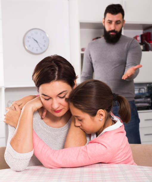 istock Father lecturing wife and daughter 1187111631