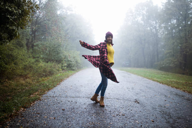 Woman feeling free in natural settings.