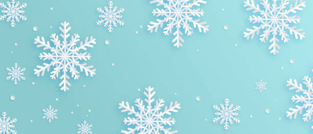 istock Paper art made snowflakes on blue background. Digital craft paper cut style. 1187115042