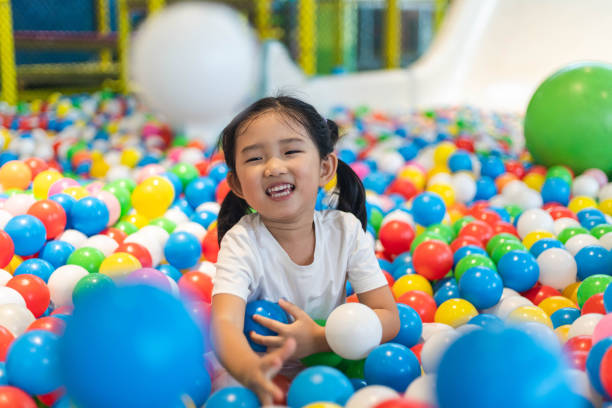 istock Cute girl at the Ball Pool 1187115063