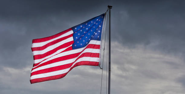 istock American flag in the wind 1187117793