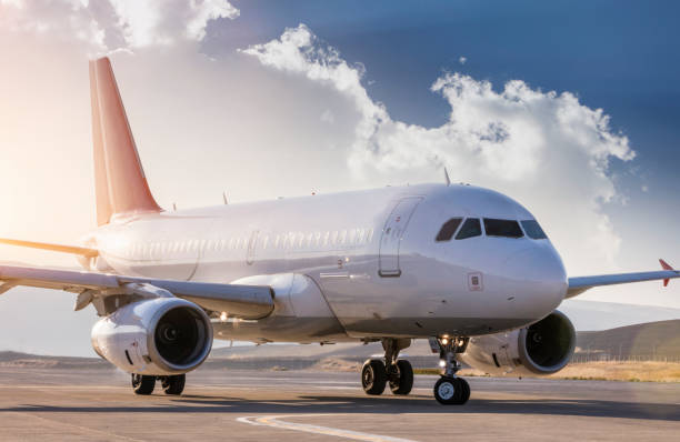 istock Passenger Arplane On Airport Runway 1187118010