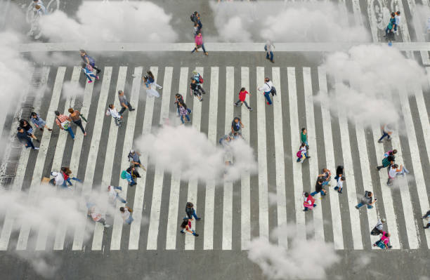 istock Aerial view of crowd with clowds 1187118592