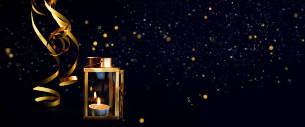 istock Golden lantern on black background 1187122314