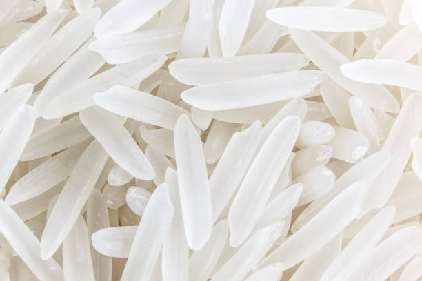 Long grain rice close-up. Macro shooting photo. close up shot of the rice background rice cereal plant photos stock pictures, royalty-free photos & images