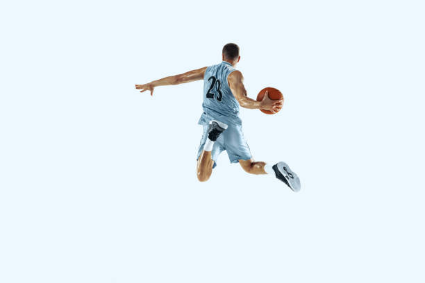 istock Young caucasian basketball player against white studio background 1187122426