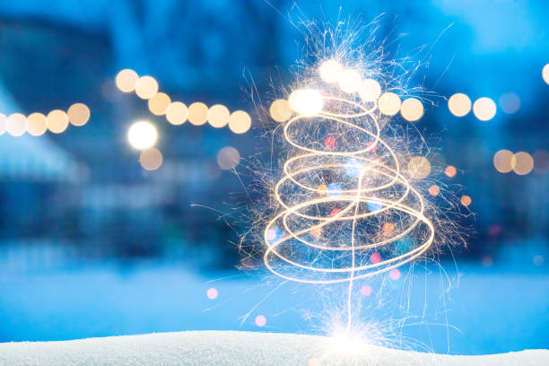 Christmas Background - Sparkler christmas tree in the snow