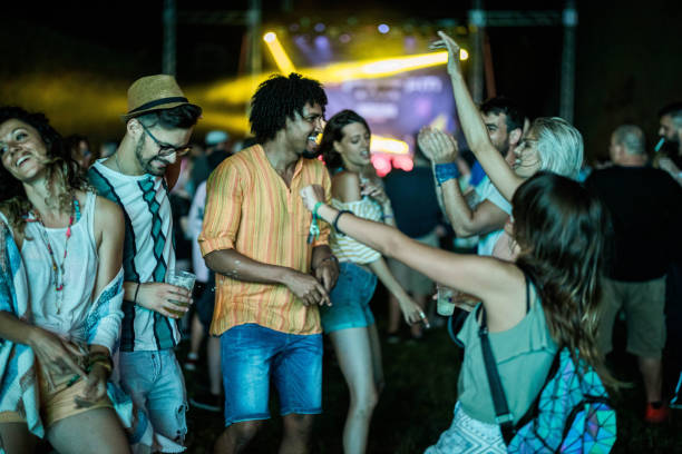 istock Dancing on music festival by night! 1187124720