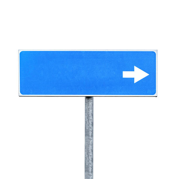 Blue sticker with an arrow up on glass along stairs. Direction leader and career