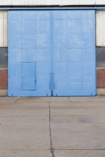 istock industrial metal door 1187131836