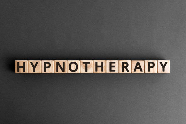 hypnotherapy - word from wooden blocks with letters - hypnotist therapy alternative therapy alternative medicine imagens e fotografias de stock