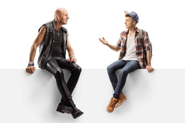 istock Hardcore punker and a male student talking and sitting on a panel 1187141326