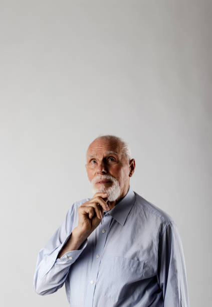istock Old man is full of doubts and hesitation. 1187142611