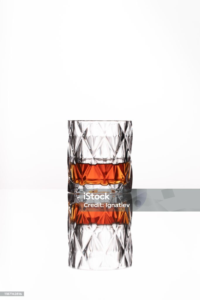 Drinking glass of whisky and brandy isolated on a white background Brandy Stock Photo