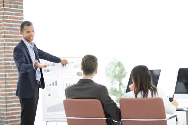 istock speaker makes a report on the presentation of the financial project 1187143674