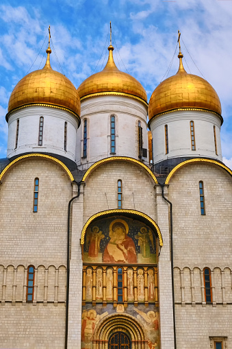 Southern portal of the Assumption Cathedral of the Kremlin. According to legend, in the 12th century Vladimir Monomakh brought the copper double-wing gate from Korsun - Moscow, Russia in June 2019