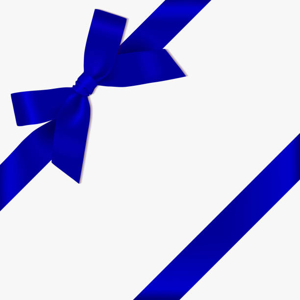 istock Realistic decorative shiny satin blue ribbon bow and ribbon, isolated on white background 1187146642