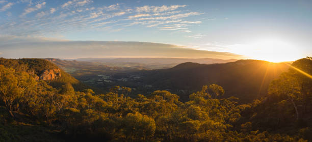 Scenic image from the blue mountain national park near Sydney in Australia. Beautiful scene with the low sun and smooth clouds. Shot during Australian spring time in Mount Victoria .