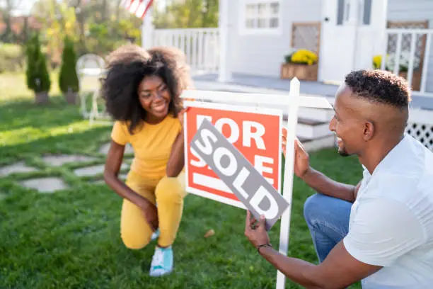 Photo of Young couple buying a new house