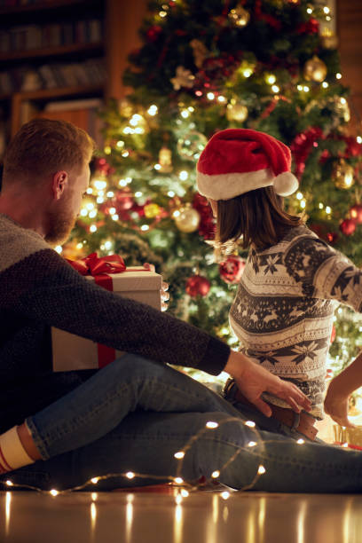 istock Young couple in love at Christmas night 1187147963