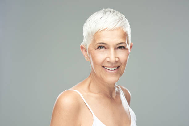 istock Senior woman posing in studio. 1187149752
