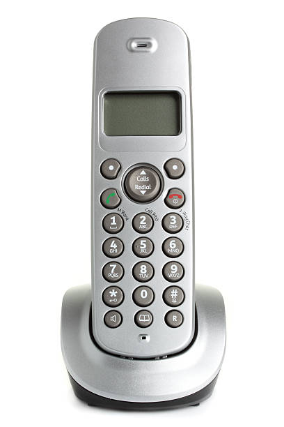 Telephone. A modern, cordless home phone, isolated on a white background. cordless phone stock pictures, royalty-free photos & images