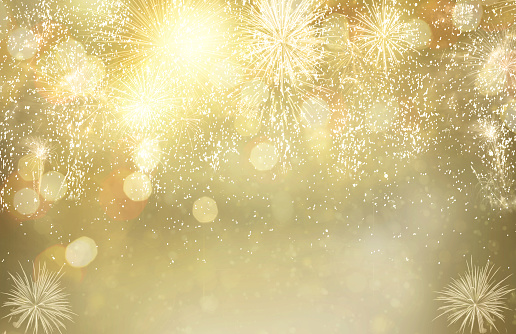 Abstract festive winter bokeh background with fireworks and bokeh lights