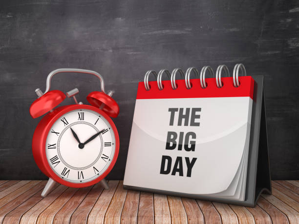 istock THE BIG DAY Calendar with Alarm Clock on Chalkboard Background - 3D Rendering 1187157620