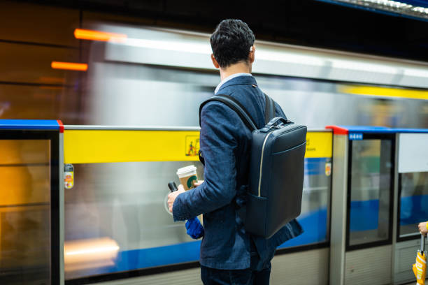 istock Waiting For Train At Subway and drinking coffee 1187160813