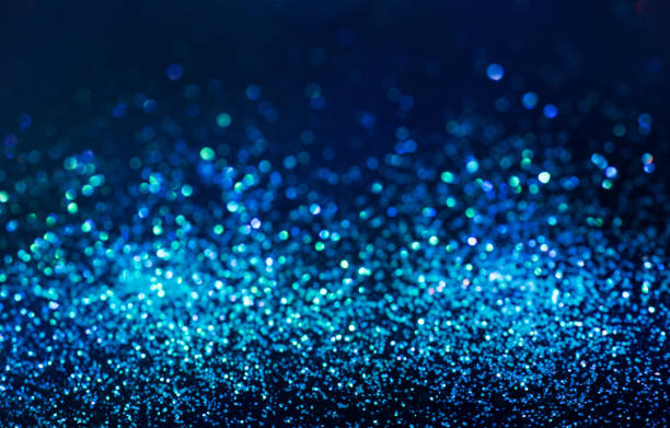 istock glitter bokeh lighting effect Colorfull Blurred abstract background for birthday, anniversary, wedding, new year eve or Christmas 1187164978