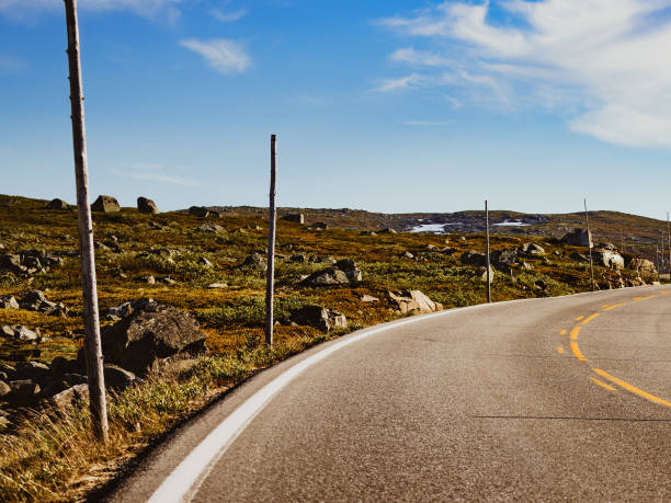istock Road crossing Hardangervidda plateau, Norway 1187166671
