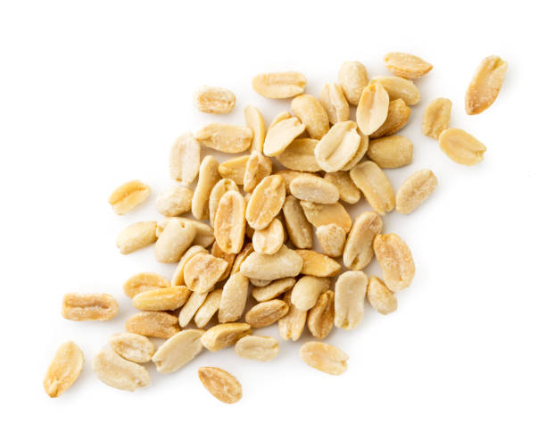 istock Peeled salted peanuts on a white. The view of the top. 1187167761
