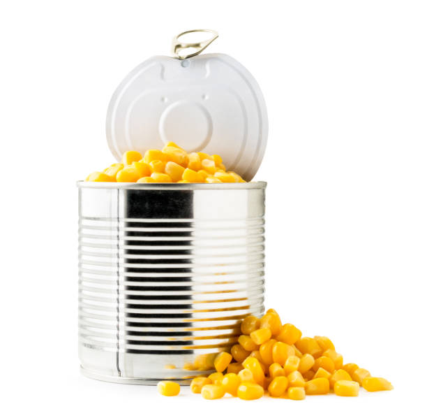 istock Open canned corn and pile on a white background. Isolated. 1187168051