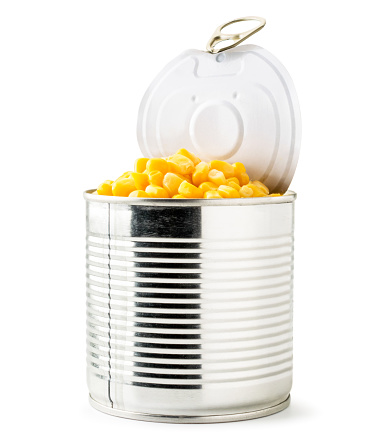 Full can of canned corn closeup on a white background. Isolated
