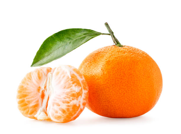 istock Ripe mandarin with leaf and peeled half on white background. Isolated 1187168233