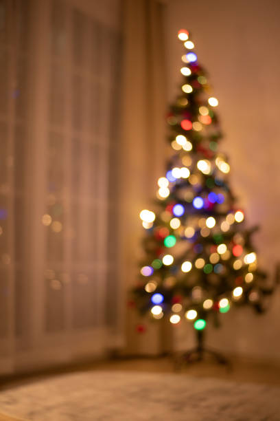 istock Abstract christmas background with defocused lights 1187169560