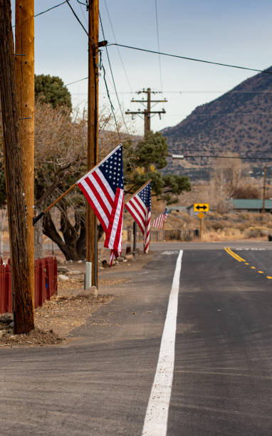 istock American Flag hanging on a flagpole on Veterans Day 1187171732