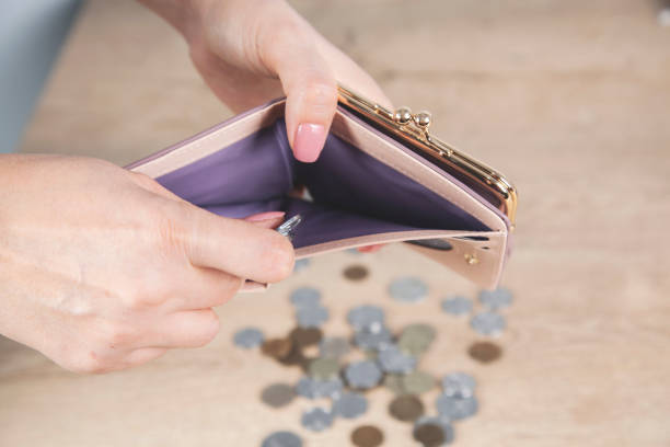 istock woman hand money with wallet 1187173988